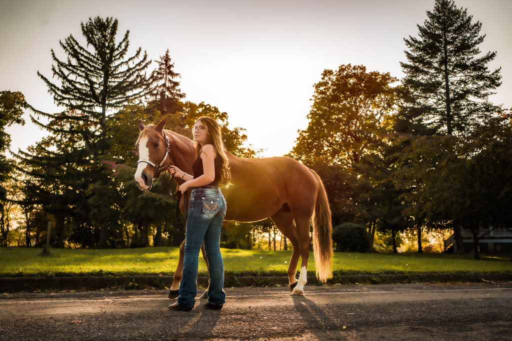 Buffalo, NY and WNY Senior Photographer. Fort Niagara State Park. Bold and Emotive Senior Portrait. Lake and pier senior portrait. Lewison NY, Newfane NY, Wilson, NY, Buffalo, NY. Golden Hour Senior Session. Jessica Stewart Photography. Equine Photography